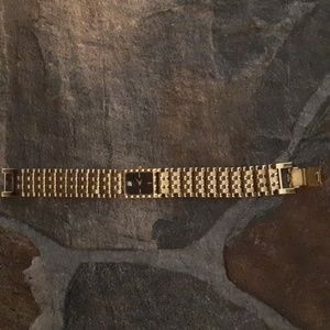 Seiko Gold Tone Watch; Black Face With Diamond from Helzberg Jeweler